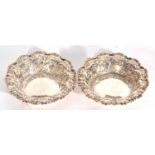 Pair of late Victorian shaped circular embossed bon-bon dishes with plain centres, 12cm diam, London