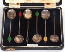 Cased set of six Edward VIII harlequin bean end coffee spoons with wire stems and oval bowls,