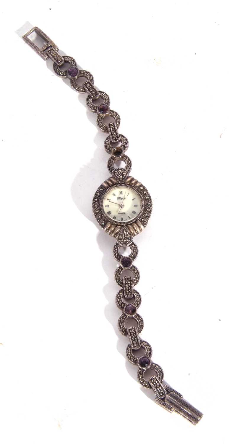 White metal ladies wrist watch featuring a mother of pearl dial with various coloured stones on - Image 2 of 5