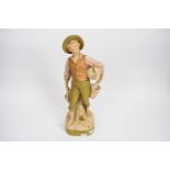 Royal Dux Bohemia model of a young boy water carrier, 40cm high