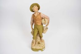Royal Dux Bohemia model of a young boy water carrier, 40cm high