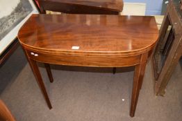 19th century mahogany D-formed tea table with folding top raised on tapering legs, 92cm wide