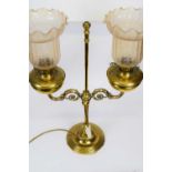 Victorian brass two-section oil lamp with adjustable bracket and two glass shades with floral