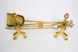 Set of brass fire irons and dogs