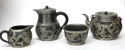 Quantity of tea wares, Chinese pottery with pewter marks for Wei-Hai-Wei, comprising tea pot, milk