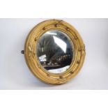 Circular mirror in gilt painted frame, 40cm diam