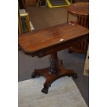 19th century rosewood pedestal card table with fold-over top opening to a blue baize lined