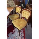 Set of six Victorian mahogany balloon back dining chairs, the seats upholstered with buttoned