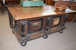 18th century and later oak Continental sideboard with two panelled doors, stylised Corinthian column