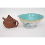 Yixing type tea pot together with a shaped Chinese porcelain bowl with a polychrome design of