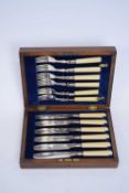 Box of plated fish knives and forks