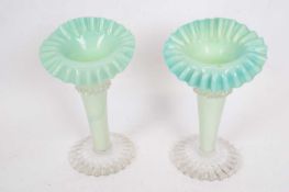 Pair of late 19th century green vaseline jack in the pulpit type vases, 22cm high