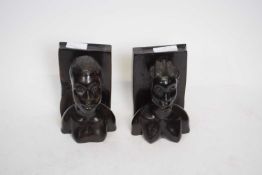 Pair of carved wooden bookends