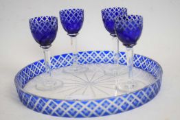 Glass circular dish, blue coloured border with four small blue coloured dishes