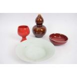 Group of Chinese ceramic wares including a celadon dish, further flambe type small bowl, a gourd