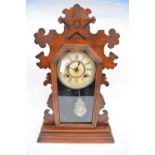 Late 19th century wooden mantel clock with Roman numerals to dial