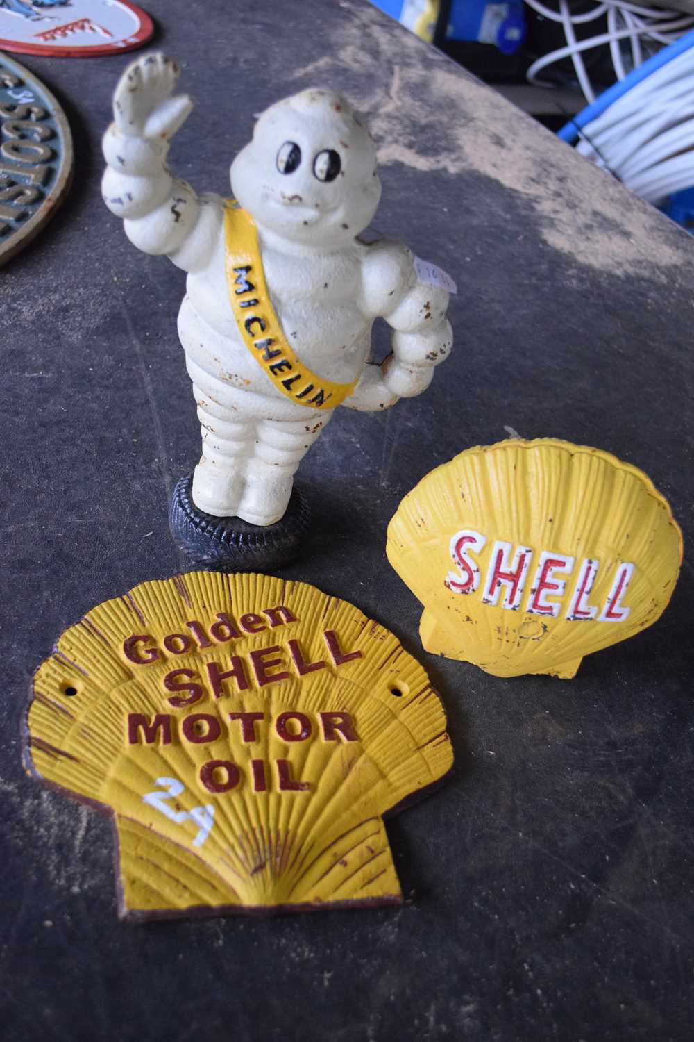 Cast Michelin money box together with a further cast Shell money box and a cast 'Shell motor oil" - Image 2 of 2