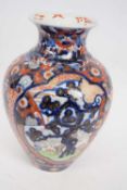 Japanese porcelain vase of baluster form decorated with an Imari design, probably Meiji period