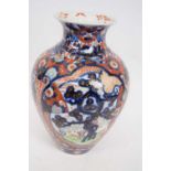 Japanese porcelain vase of baluster form decorated with an Imari design, probably Meiji period