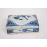 Chinese porcelain box and cover with painted blue and white design