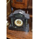 Victorian black slate and grey marble cased mantel clock, the enamelled dial with Arabic numerals to