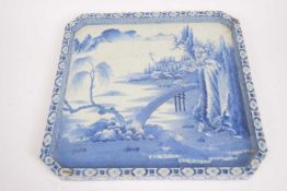 Large porcelain tray, probably Japanese, with a blue and white island scene, 33cm diam (stapled