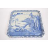 Large porcelain tray, probably Japanese, with a blue and white island scene, 33cm diam (stapled