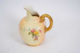Large Royal Worcester ewer, the blush ground decorated with flowers