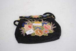 Early 20th century handbag with black beaded and floral design