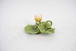 Majolica style taper stick modelled as lilies