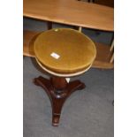 Victorian mahogany piano stool with upholstered circular revolving top, 48cm high