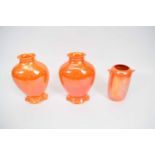 Group of three unusual Royal Doulton orange glazed vases, tallest 19cm high (3)