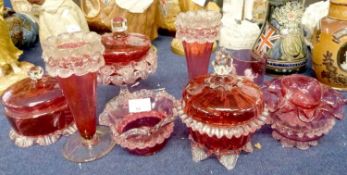 Quantity of cranberry glass, pair of vases, various jars and covers, beaker with Mary Gregory