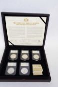 Box containing the Morgan dollar mint mark collection with examples for Philadelphia, Carson City,
