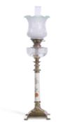 19th century oil lamp with glass shade and reservoir, the central ceramic column, probably Royal