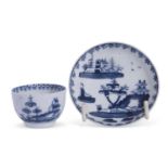 A Lowestoft porcelain toy or minaiture teabowl and saucer c.1765 painted in blue with a pagoda and