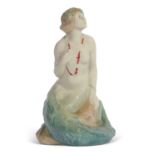 A mid 20th century Royal Doulton figure of a mermaid factory stamp and HN 97 to base.19cm highGood