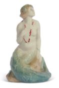 A mid 20th century Royal Doulton figure of a mermaid factory stamp and HN 97 to base.19cm highGood