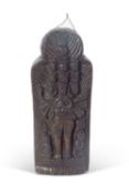 Nepalese carved wooden shrine, the base embedded with prayers, 40cm high