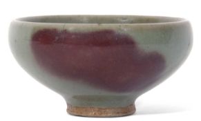 Small Jun ware bowl with flambe type design on green ground