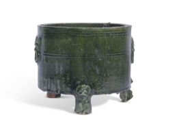Chinese pottery Song green glazed censer raised on three feet with lions head terminals, 15cm high