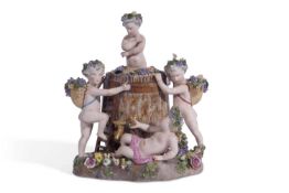 Large Meissen centre piece decorated with scene of Cherubs with panniers of fruiting vines with