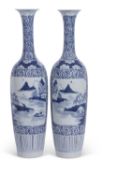Pair of Oriental blue and white vases, probably Japanese, with chinoiserie designs, 52cm high