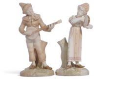 Pair of Royal Worcester Hadley figures of musicians modelled as a boy and a girl, the girl with
