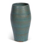 A mid 20th century vase by Susie Cooper the ovoid body with a mottled green glaze and ribbed