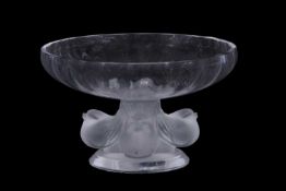 A Lalique Nogent clear and frosted glass bowl on pedestal base supported by four birds above a