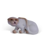 A Royal Worcester netsuke model of a cheetah or white panther c.1912/13 green factory mark to base