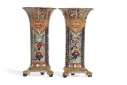 A pair of early 20th century Copeland Spode cylindrical vase of lobed form with an Imari design