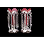 Pair of cranberry table lustres with white overlay in Bohemian style and prismatic droplets, 24cm