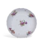 Large porcelain dish with Osier border decorated with flowers in Meissen style, indistinct blue